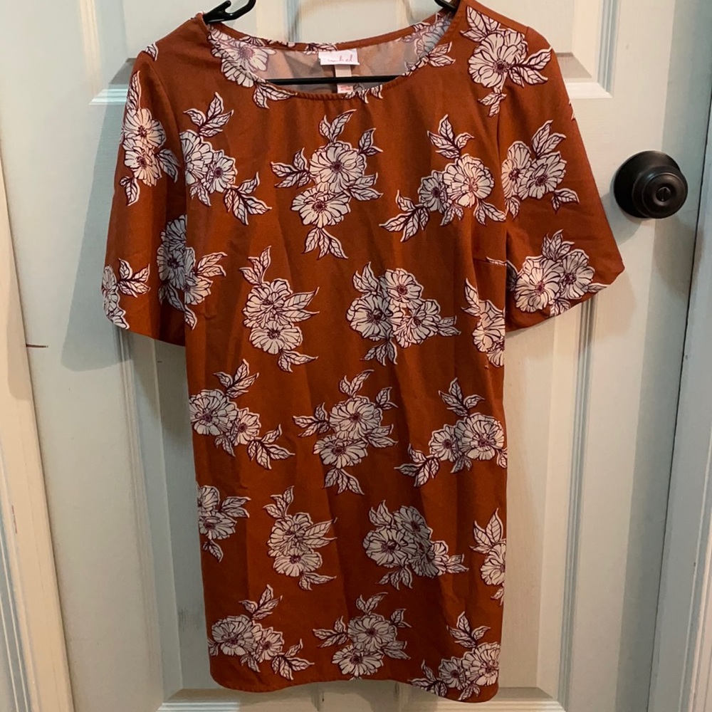 Isabel Maternity floral short sleeve tunic top size small